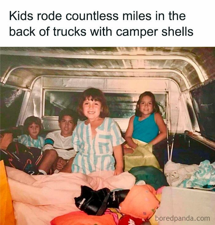 Kids riding in the back of a truck with camper shells, capturing good old days memories from the 80s childhood.