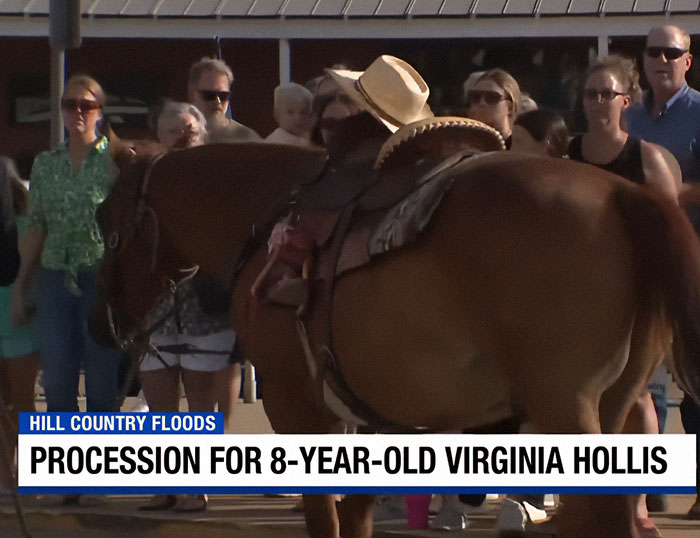 Horse walks behind hearse with 8-year-old's tiny hat and boots during Camp Mystic tragedy procession. Horse walks behind hearse with 8-year-old's tiny hat and boots during Camp Mystic tragedy procession.