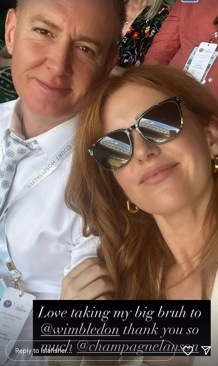 Isla Fisher wearing sunglasses with reflection at Wimbledon, sharing a message about marriage after divorce. Isla Fisher wearing sunglasses with reflection at Wimbledon, sharing a message about marriage after divorce.