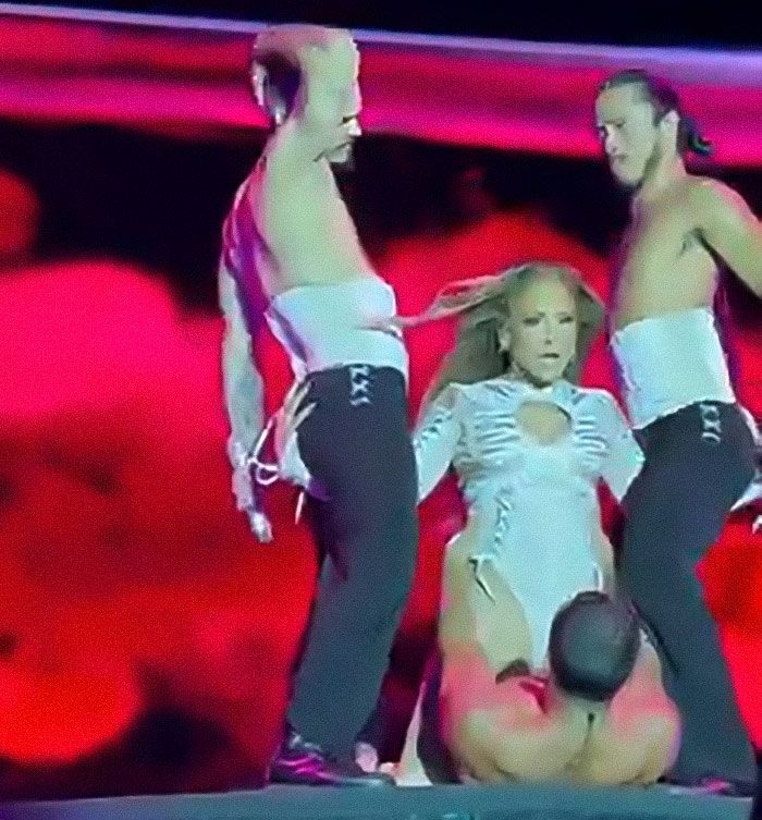 Jennifer Lopez performing raunchy show with dancers, criticized for simulating x-rated moves on stage. Jennifer Lopez performing raunchy show with dancers, criticized for simulating x-rated moves on stage.