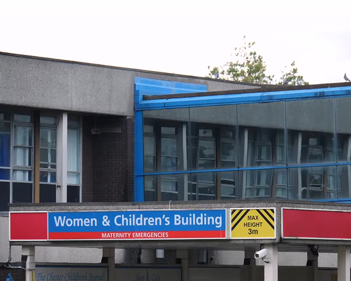 Exterior of a Women and Children's Building sign at a hospital linked to nurse and foul play suspicions in baby deaths case. Exterior of a Women and Children's Building sign at a hospital linked to nurse and foul play suspicions in baby deaths case.