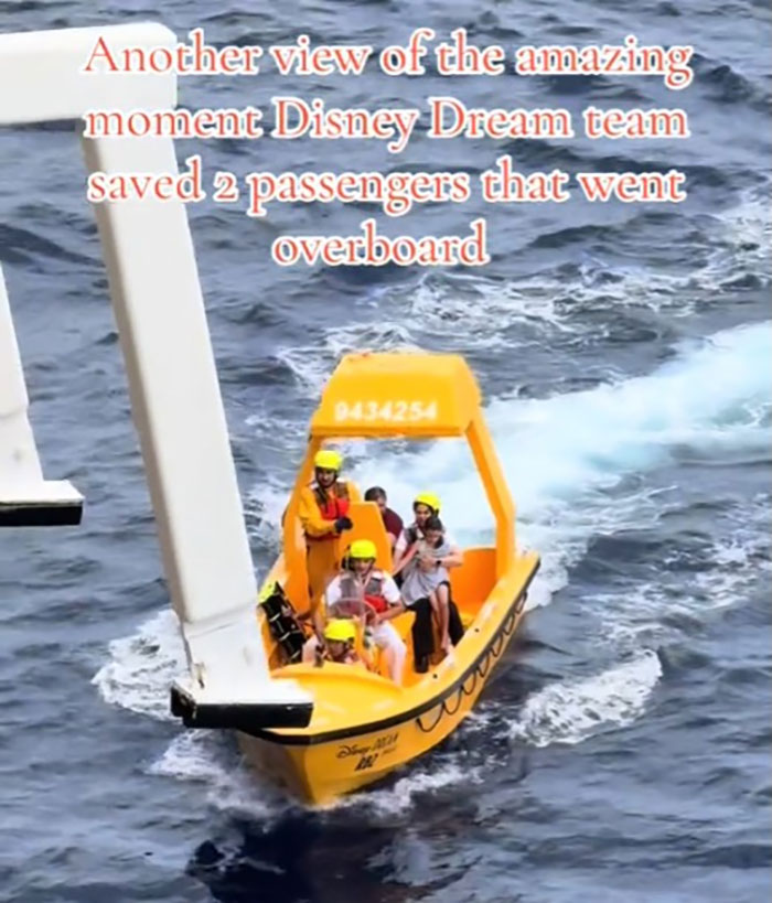 Rescue team on a yellow boat saving passengers overboard from a cruise ship in ocean waters during an emergency response. Rescue team on a yellow boat saving passengers overboard from a cruise ship in ocean waters during an emergency response.