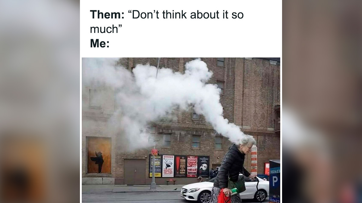 Elderly woman with smoke billowing from her head, illustrating chaotic and random meme humor on a city street.