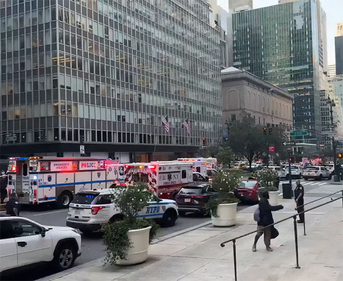 NYPD cop fatally shot while protecting others near city street with police and emergency vehicles responding. NYPD cop fatally shot while protecting others near city street with police and emergency vehicles responding.