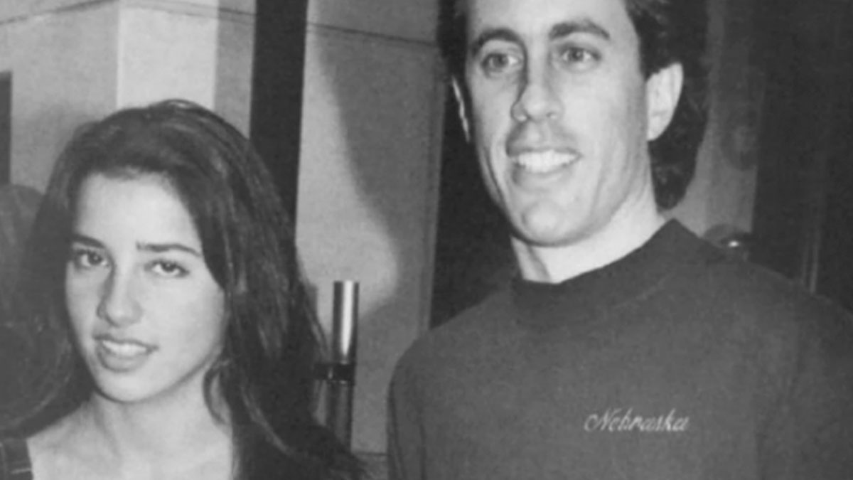 Black and white photo of a man and woman with an oddly horrifying vibe, evoking unsettling and unnerving emotions.