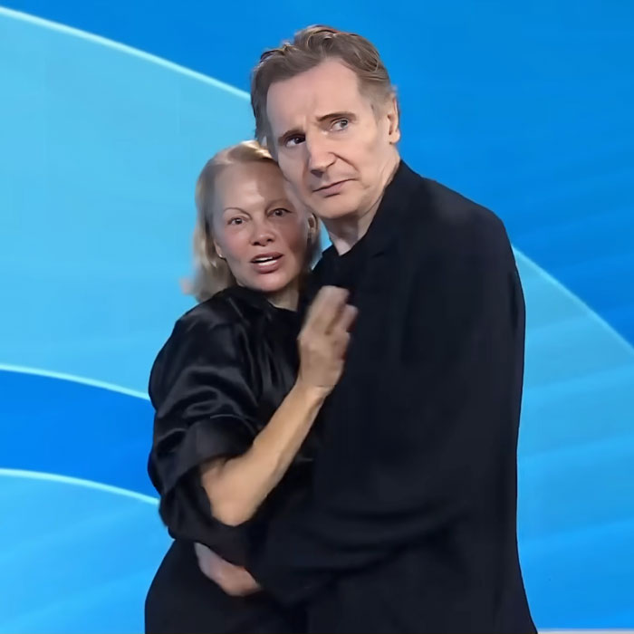 Pamela Anderson and Liam Neeson embracing closely against a blue background, revealing their dating news. Pamela Anderson and Liam Neeson embracing closely against a blue background, revealing their dating news.
