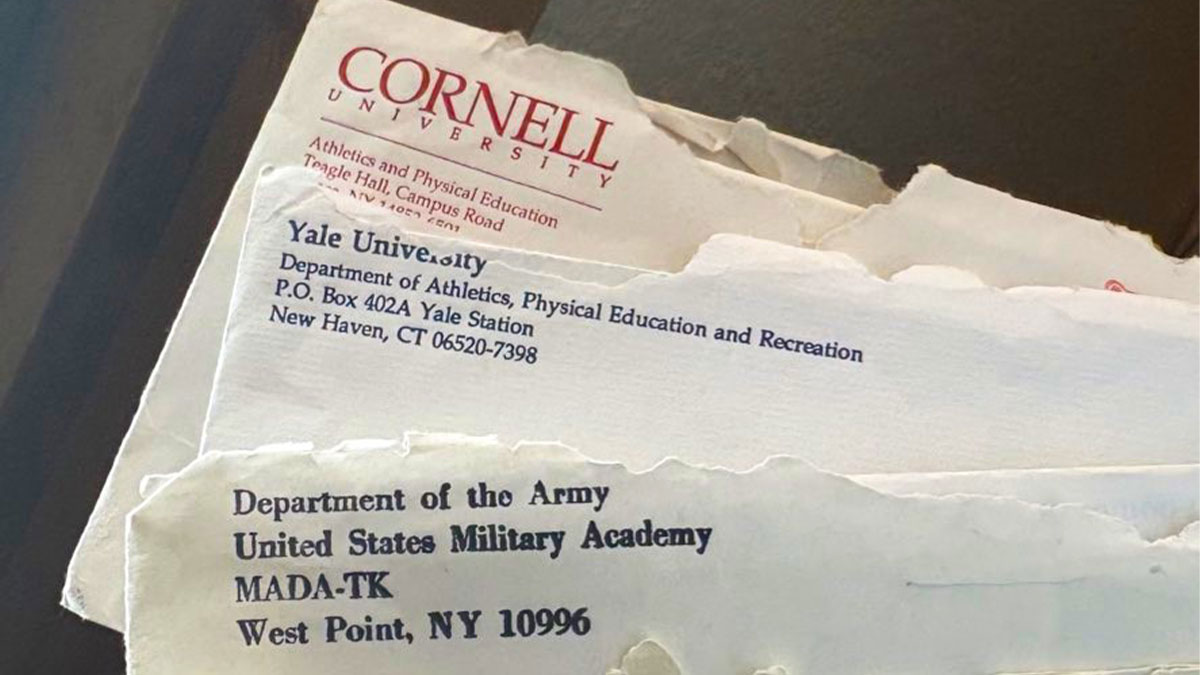 Stack of torn Ivy League scholarship offer letters from Cornell University, Yale University, and West Point military academy.