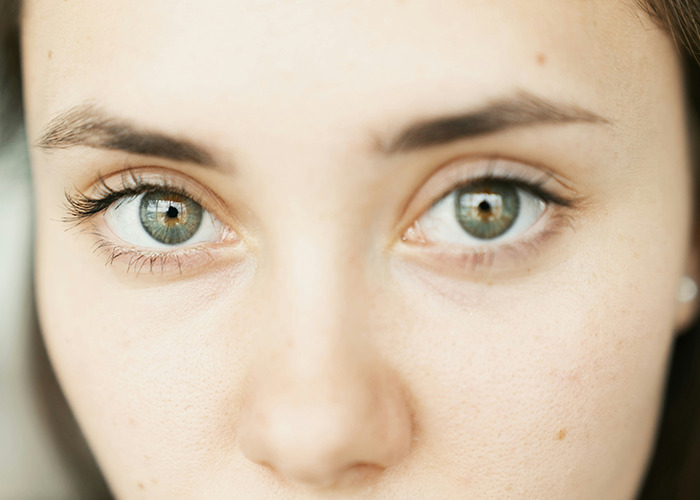Close-up of a person's face focusing on the eyes, illustrating the theme of savage insults and reactions.