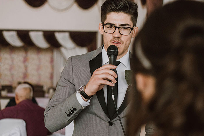 Best man giving speech comparing groom's choice in bride to IKEA shopping trip at a wedding ceremony