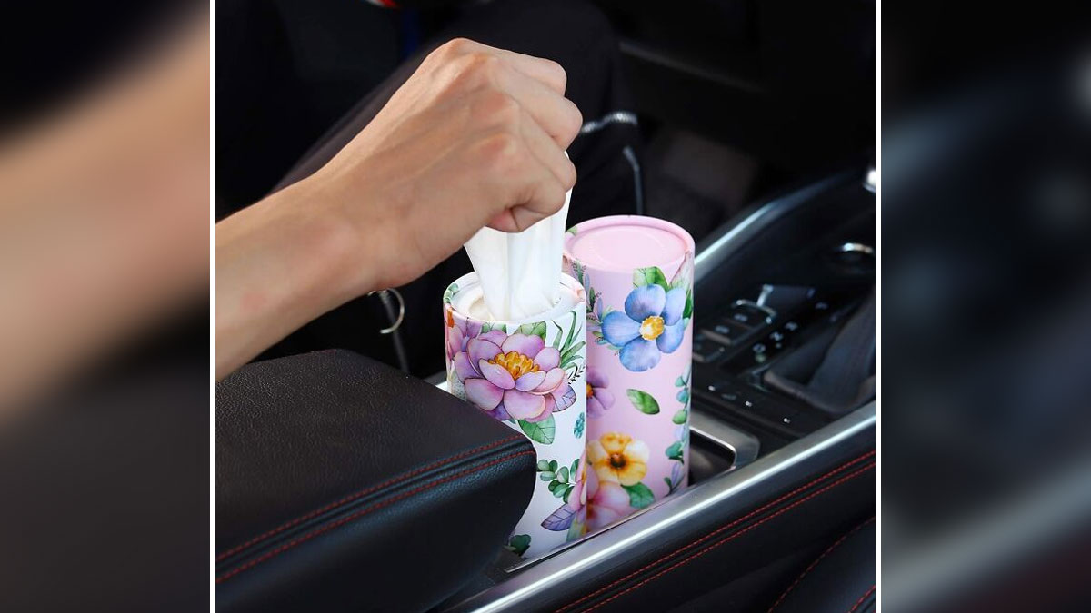 Floral tissue holders as car accessories placed in a cup holder for passenger seat storage and organization.