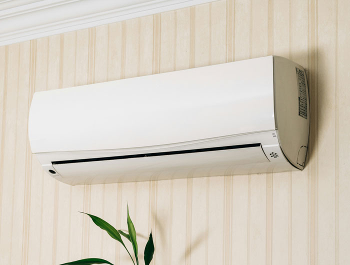 Smart air con mounted on wall, illustrating man gets revenge on late-night neighbor by turning it into a 3AM ice machine. Smart air con mounted on wall, illustrating man gets revenge on late-night neighbor by turning it into a 3AM ice machine.