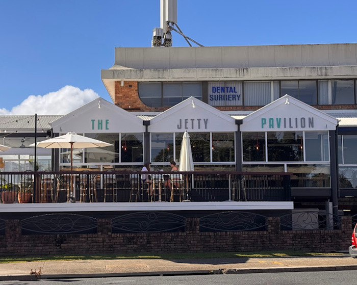 The Jetty Pavilion, a popular Australian restaurant with outdoor seating on a clear sunny day. The Jetty Pavilion, a popular Australian restaurant with outdoor seating on a clear sunny day.