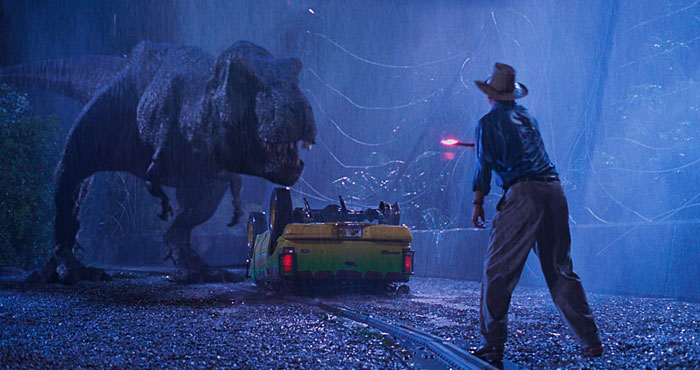 Tyrannosaurus rex confronting a man at night in a scene from Jurassic Park, highlighting dinosaurs disbelief conflict. Tyrannosaurus rex confronting a man at night in a scene from Jurassic Park, highlighting dinosaurs disbelief conflict.