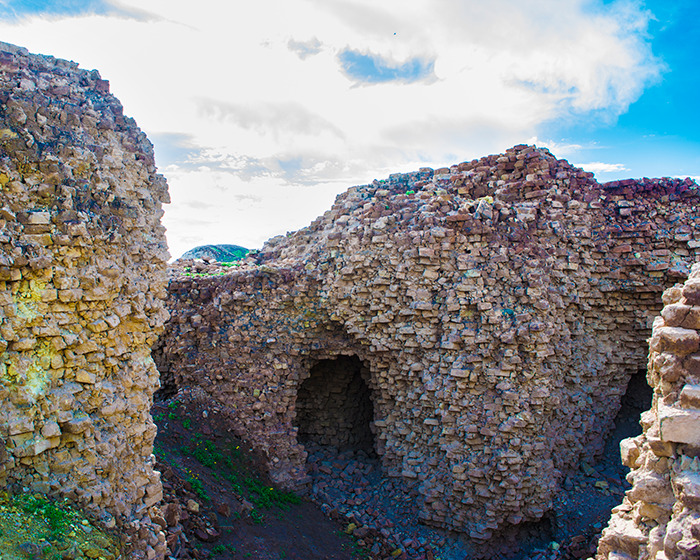 Ancient stone ruins under a cloudy sky, related to scientists deciphering a mysterious 3,000-year-old text on women’s roles.