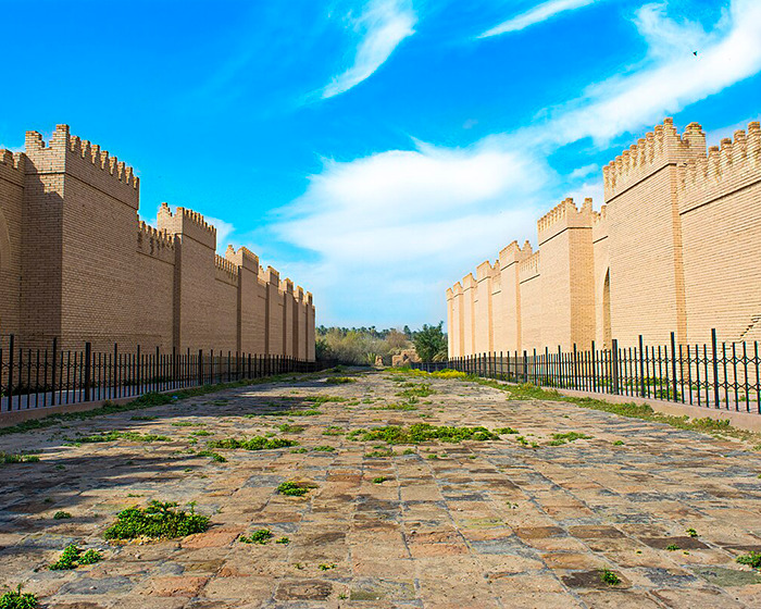 Ancient brick walls under a bright sky representing the site where scientists decipher mysterious 3,000-year-old text revealing women's roles.