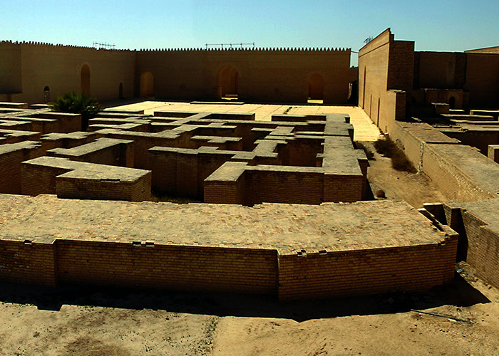 Ancient brick ruins under bright sunlight, related to scientists deciphering mysterious 3,000-year-old text on women’s roles.