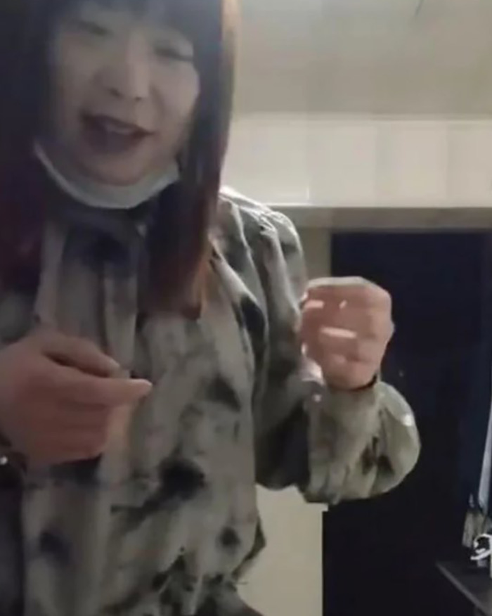 Person in a tie-dye shirt posing indoors, linked to viral predator Sister Hong secretly filming intimate encounters. Person in a tie-dye shirt posing indoors, linked to viral predator Sister Hong secretly filming intimate encounters.