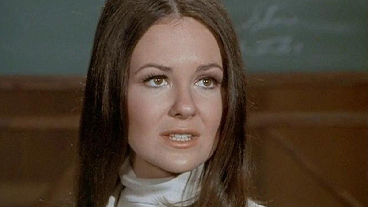 Actress from The Donna Reed Show in a close-up shot, highlighting changes from plastic surgery and cheap hair dye.