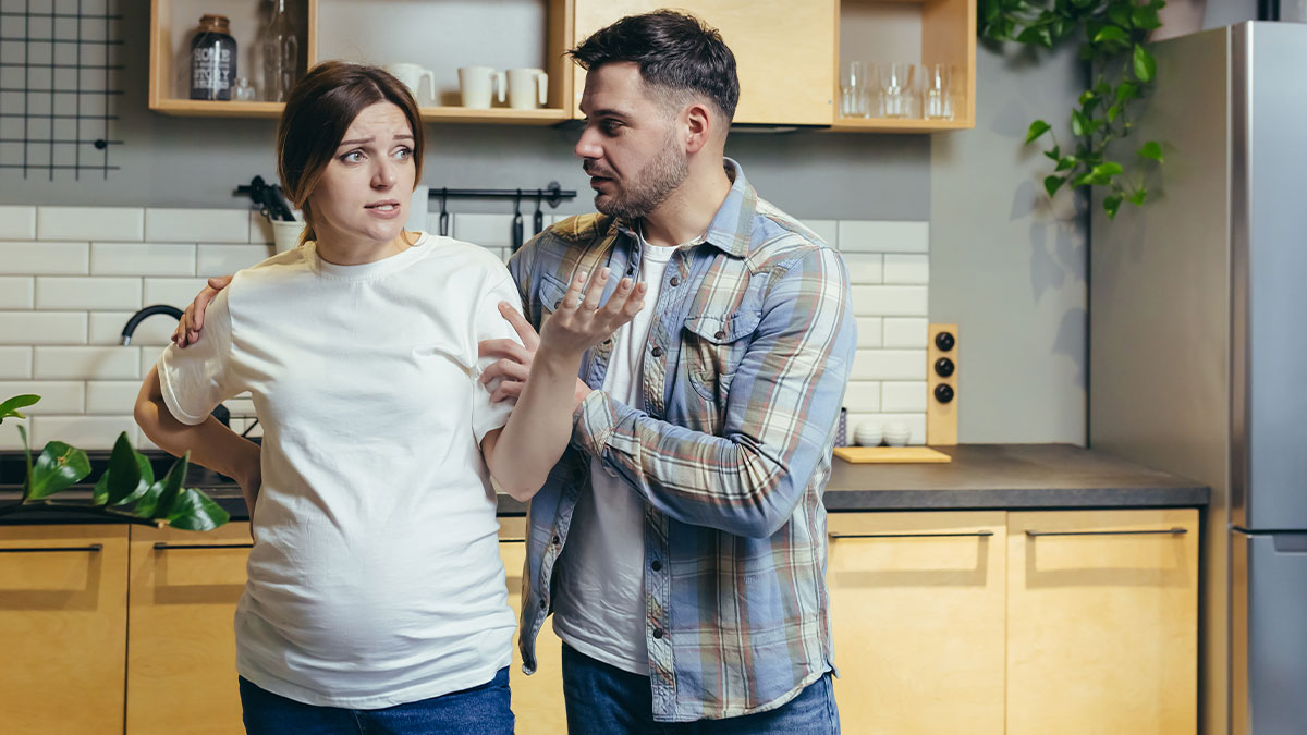 Woman upset with man in kitchen, showing refusal to forgive stepsis, depicting toxic family conflict and broken trust.