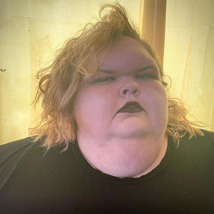 Tammy Slaton from 1000-Lb. Sisters posing indoors with dark lipstick after skin removal surgery results reveal changes. Tammy Slaton from 1000-Lb. Sisters posing indoors with dark lipstick after skin removal surgery results reveal changes.