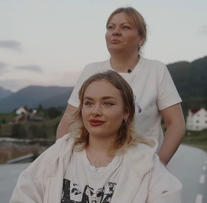 Two women outdoors with scenic background, illustrating a story about a model found with broken limbs and spine. Two women outdoors with scenic background, illustrating a story about a model found with broken limbs and spine.