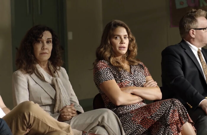 Three people in serious conversation, featuring characters from shows with personalities hard to love.