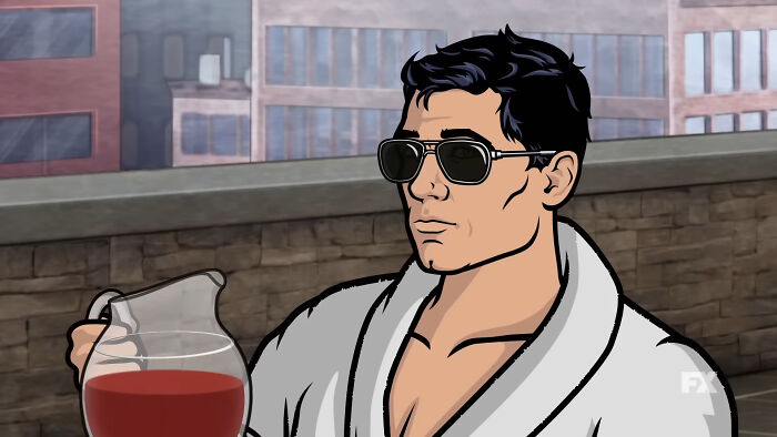 Animated character wearing sunglasses and a robe, holding a pitcher, representing shows with hard to love characters.