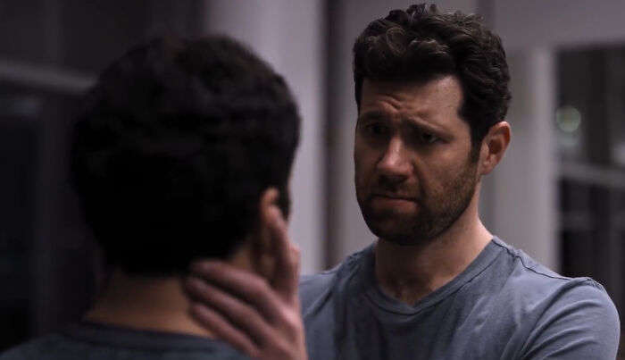 Two male characters in a tense moment, capturing emotions from shows with characters that are very hard to love.