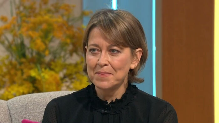 Woman in a black blouse appearing on a talk show discussing celebrities many people love but honestly can't stand.