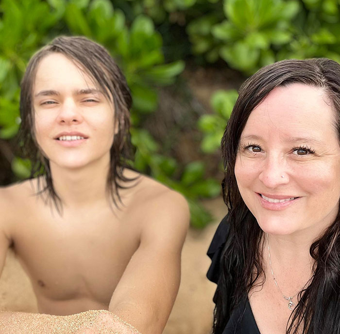 Young shirtless teen and woman with wet hair smiling outdoors, related to Idaho teen sniper Instagram story and motive revealed. Young shirtless teen and woman with wet hair smiling outdoors, related to Idaho teen sniper Instagram story and motive revealed.