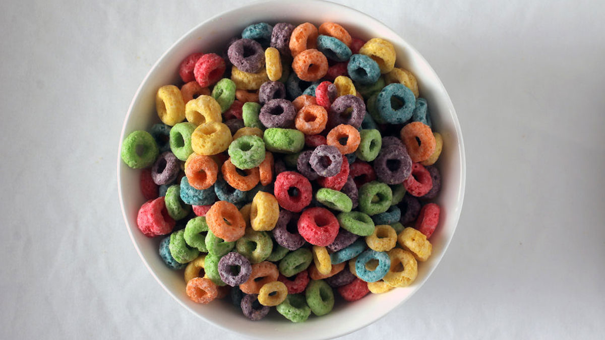 Bowl of colorful American breakfast cereal rings, a common American food banned in other countries for additives and colors