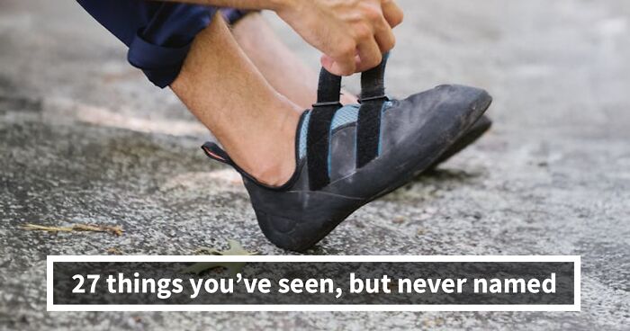 Person putting on rock climbing shoes, testing their fit on a rough outdoor surface for grip and comfort.