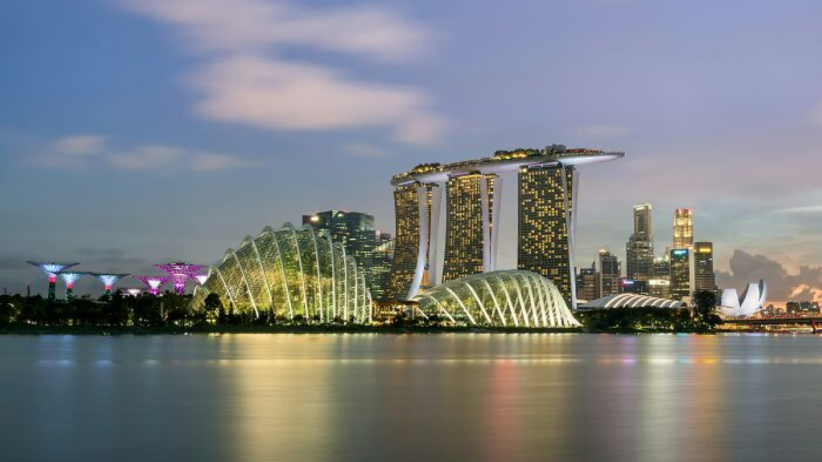 Night skyline of a futuristic cityscape showcasing innovation and technology in the smartest countries shaping the future world.