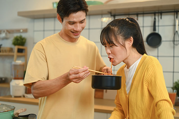 Woman panics as husband remembers friend’s favorite drink from years ago in a playful and jealous moment at home. Woman panics as husband remembers friend’s favorite drink from years ago in a playful and jealous moment at home.