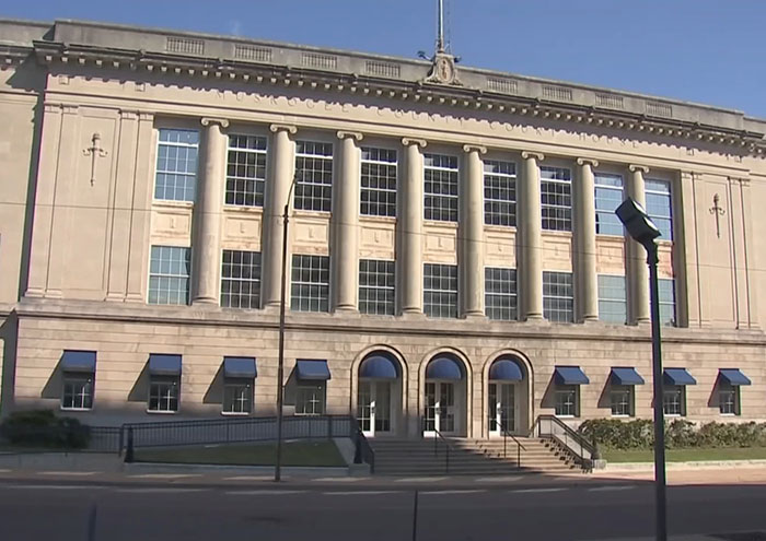 Courthouse exterior with columns and steps, related to stepdad and mom facing felony charges after home birth incident. Courthouse exterior with columns and steps, related to stepdad and mom facing felony charges after home birth incident.