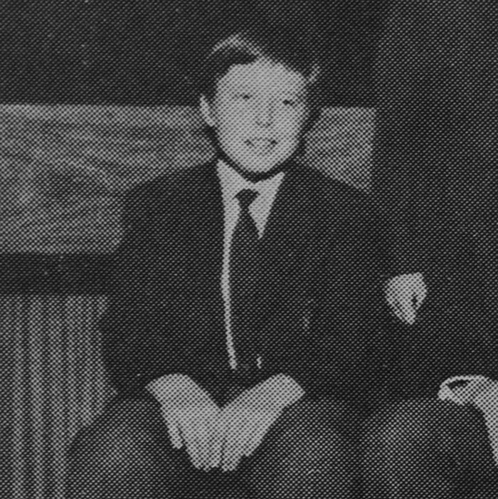 Black and white image of a young boy in formal attire related to 40-year-old Kenyan man's Elon Musk eldest son claim. Black and white image of a young boy in formal attire related to 40-year-old Kenyan man's Elon Musk eldest son claim.