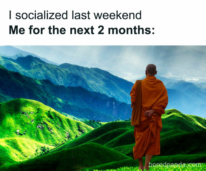 Person in orange robe standing alone on green hills with mountains in the background, depicting relatable friendship meme.