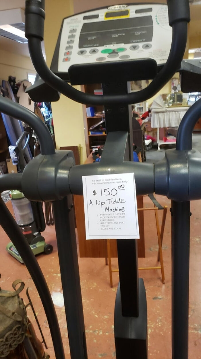 Sign on exercise machine with a humorous typo calling it a Lip Tickle Machine, illustrating common typos that question intelligence.