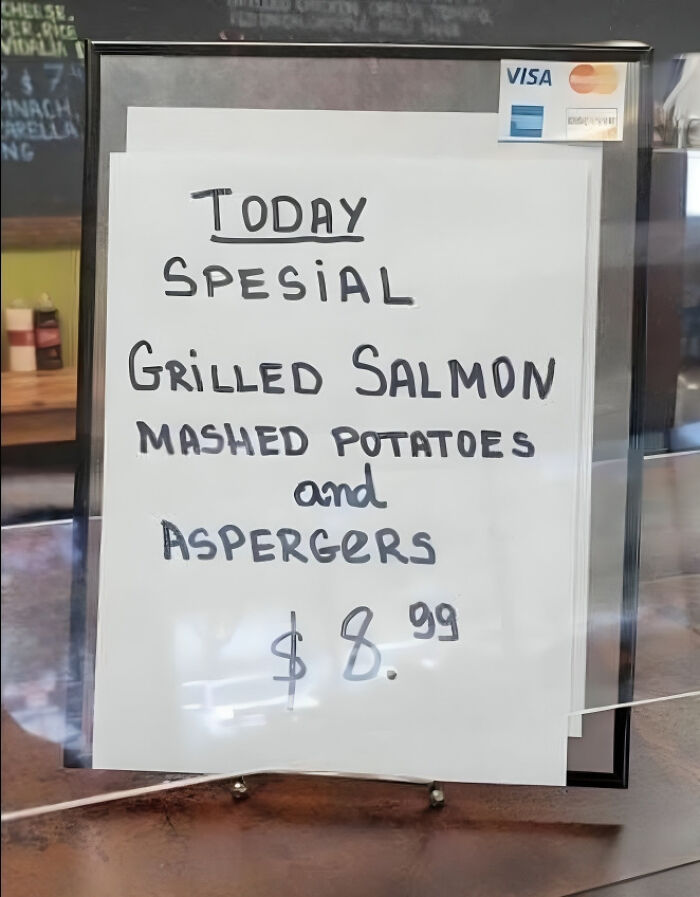 Handwritten menu sign with typos spelling special as spesial and asparagus as aspergers, illustrating common typos.