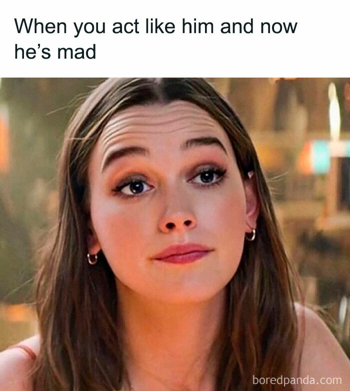 Young woman with a playful expression, illustrating hilariously relatable friendship memes for sharing with best friends.