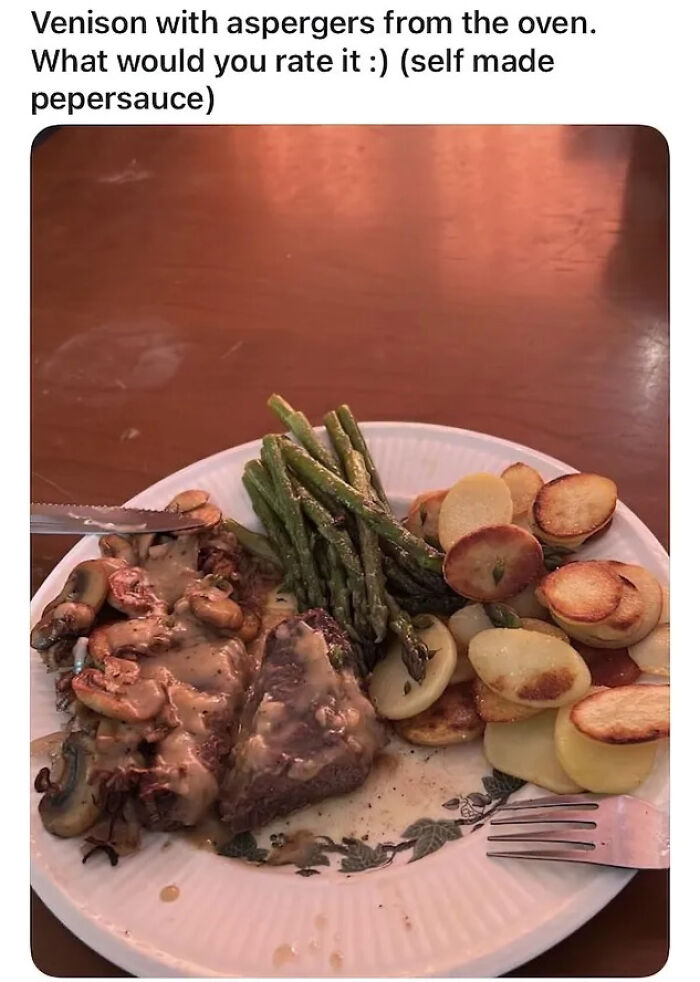 Plate of venison with asparagus and potatoes showcasing a humorous typo related to common typos questioning intelligence.