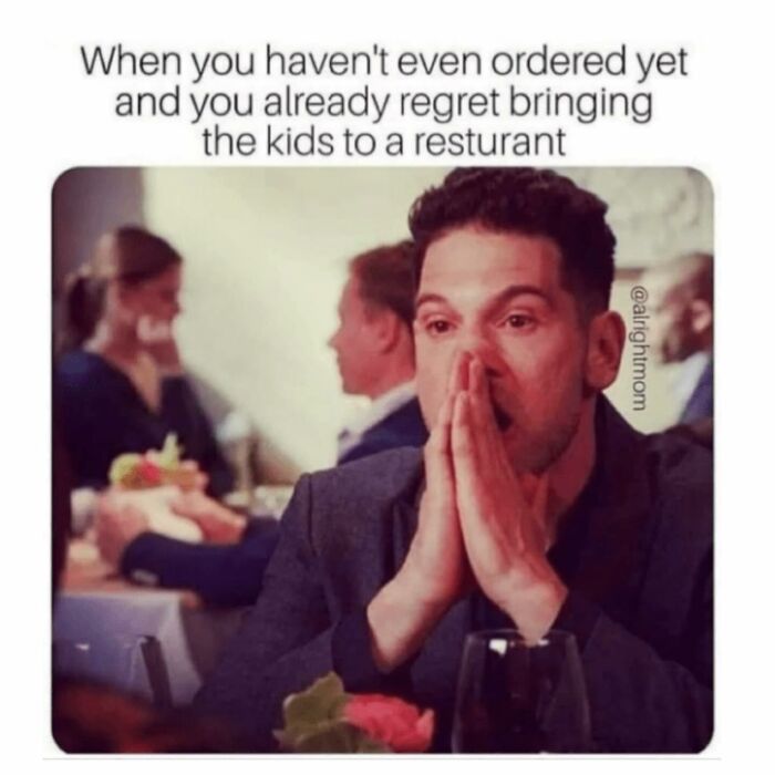 Man in a restaurant looking stressed, illustrating funny parenting memes about challenges no parenting book can teach.