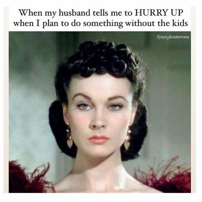 Woman with vintage hairstyle and serious expression illustrating funny parenting moments about things no parenting book can teach.