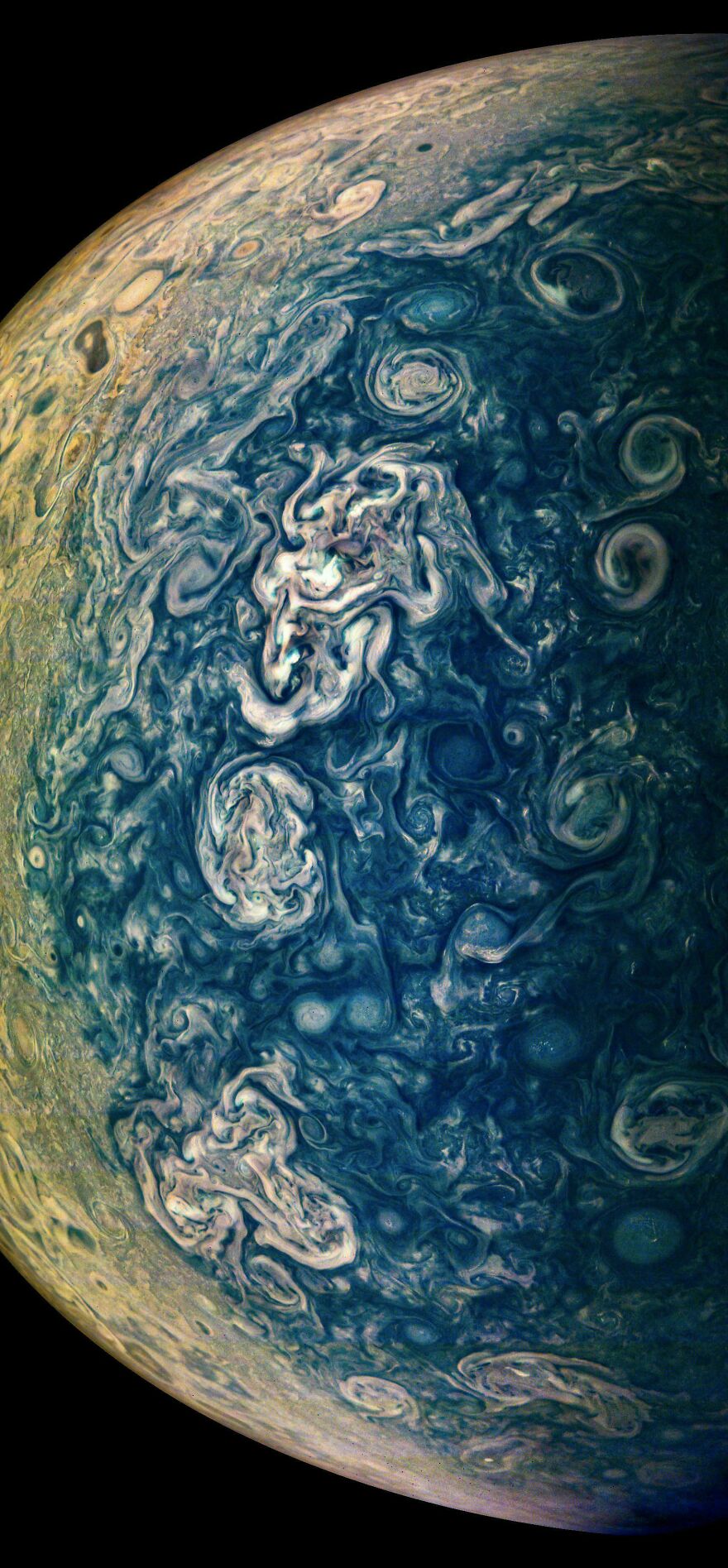 Planet Jupiter's swirling cloud patterns captured in a detailed image, showing the fascinating natural phenomena.