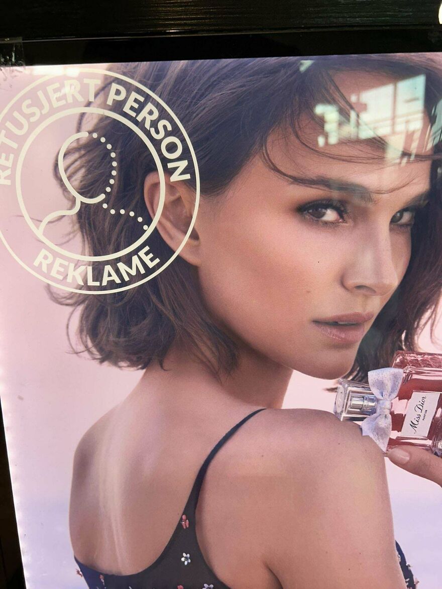 Woman holding perfume bottle with retouched person notice in an interesting community post image.