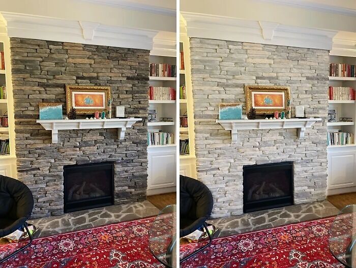 Cozy home corner with stone fireplace, decorated mantle, bookshelves, and vibrant red patterned rug.