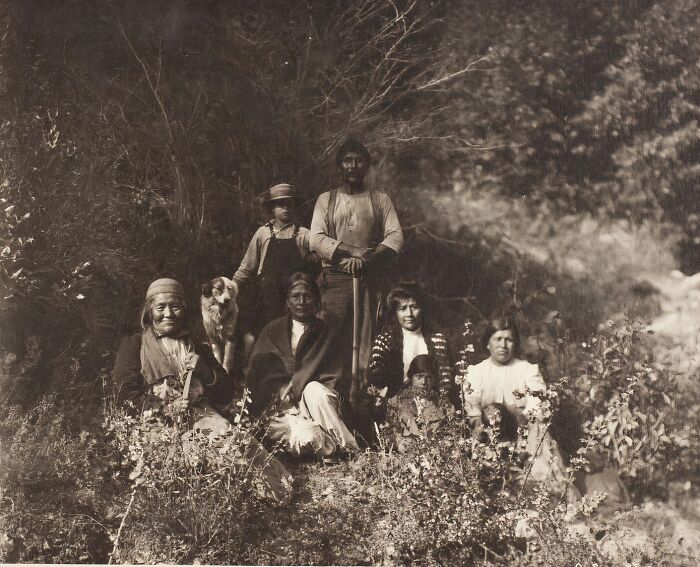 Vintage photo of Native tribes members in the 1900s showcasing the strength and resilience of early Native communities.