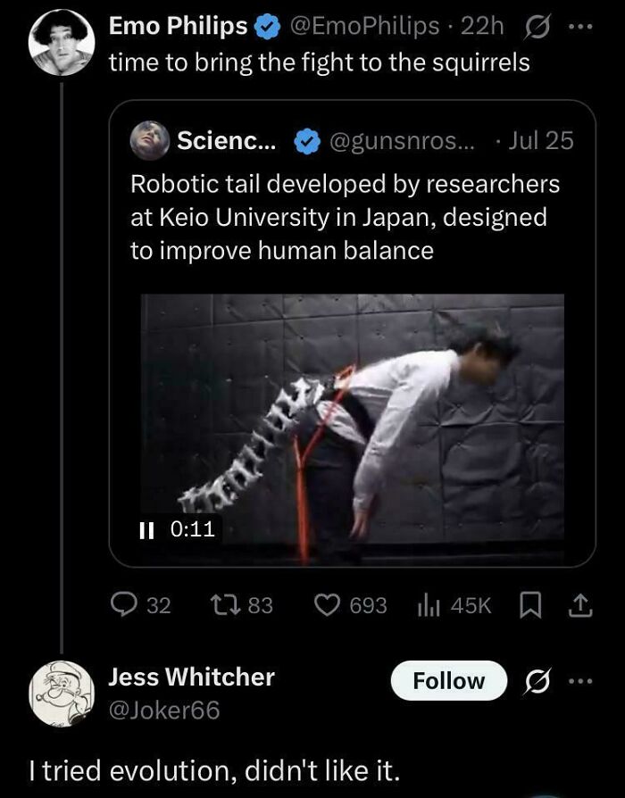 Tweet showing a person wearing a robotic tail from Keio University, with a funny comment caption about fighting squirrels.