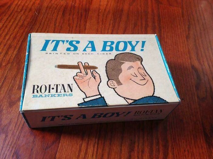 Vintage Roi-Tan Bankers cigar box with nostalgic design and retro illustration on wooden surface.