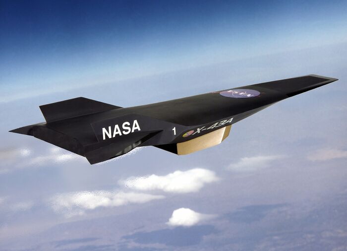 NASA experimental aircraft X-43A flying high above Earth showcasing record-breaking inventions speed technology.